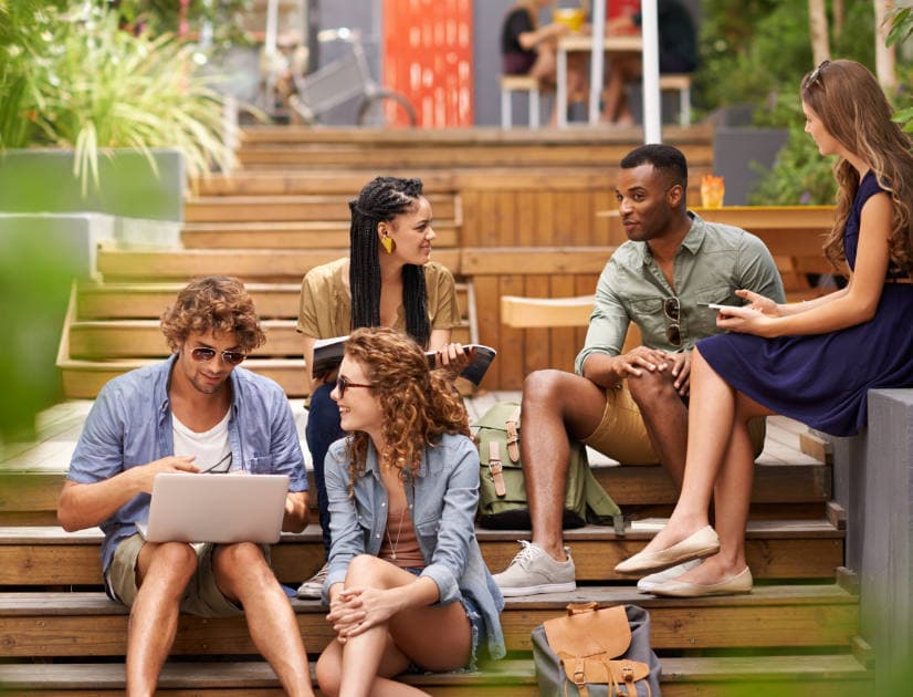 Students sitting on school steps